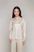 Carre Noir Button Down Gold Blouse available at Mildred Hoit in Palm Beach.