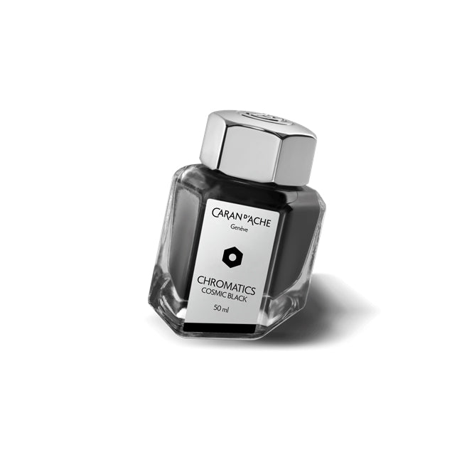 A 50ml bottle of Caran d'Ache Cosmic Black ink, with a silver cap and label displaying the brand and product name.