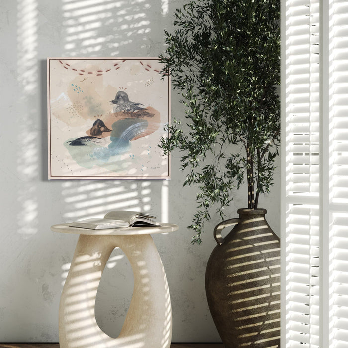 The artwork, Common Goldeneye, the Bond of Ducks, by Alicia Hauff, displayed in a room.