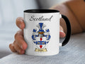 Ewart Scottish family crest accent mug with Scotland above the coat of arms design