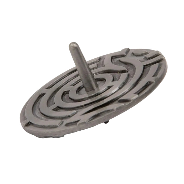 A silver finish metal spinning top with an embossed maze pattern.