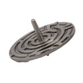 A silver finish metal spinning top with an embossed maze pattern.