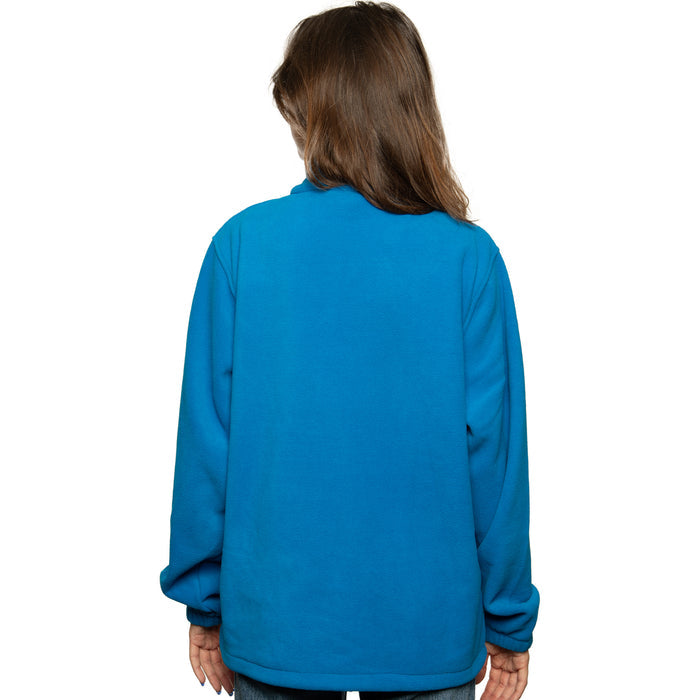 Back view of A woman wearing a blue full-zip fleece jacket with the Getty Villa Museum logo embroidered on the chest, standing against a plain background.