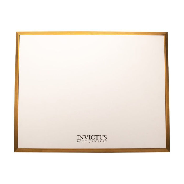 Invictus Satin Brass Frame on White Leatherette with Empty Display Base