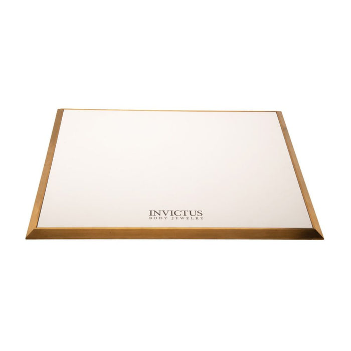 Invictus Satin Brass Frame on White Leatherette with Empty Display Base