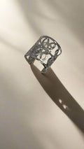 Kenneth Jay Lane Polished Silver Trim Open Circles Cuff Bracelet - Mildred Hoit