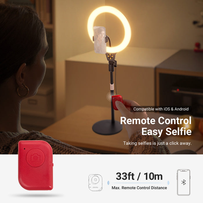 A girl adjusts the NEEWER N37 RGB Ring Light using a remote control