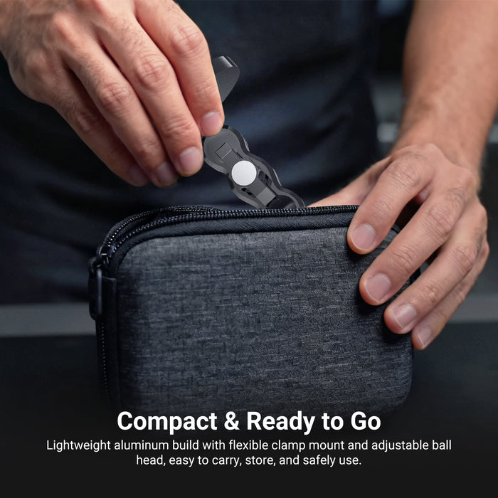 The man prepared to put the NEEWER PA150 Magnetic Phone Mount in his bag.