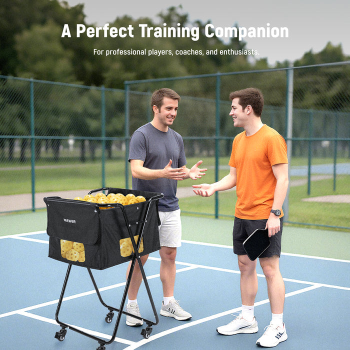 Two boys are using the NEEWER PB01X Tennis Ball Hopper to store tennis balls during practice.