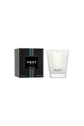 Ocean Mist Nest candle and packaging on a white background.