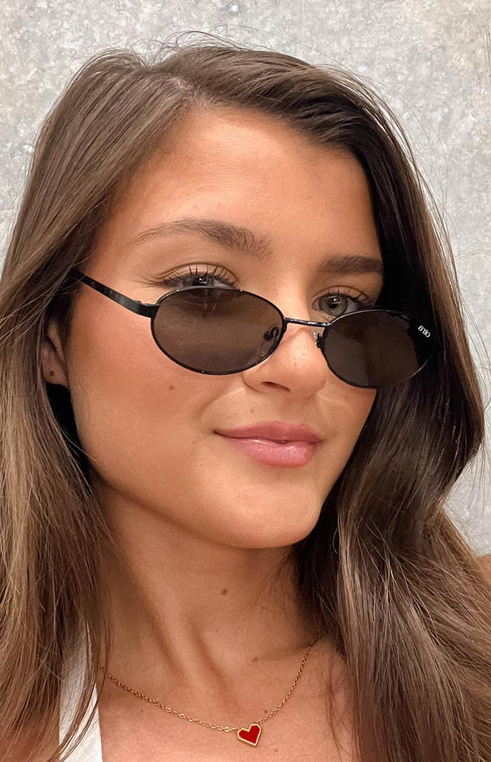 Otra Eyewear Rosie Black Oval Sunglasses